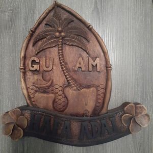 Hand carved wood Guam Seal with "hafa adai"
